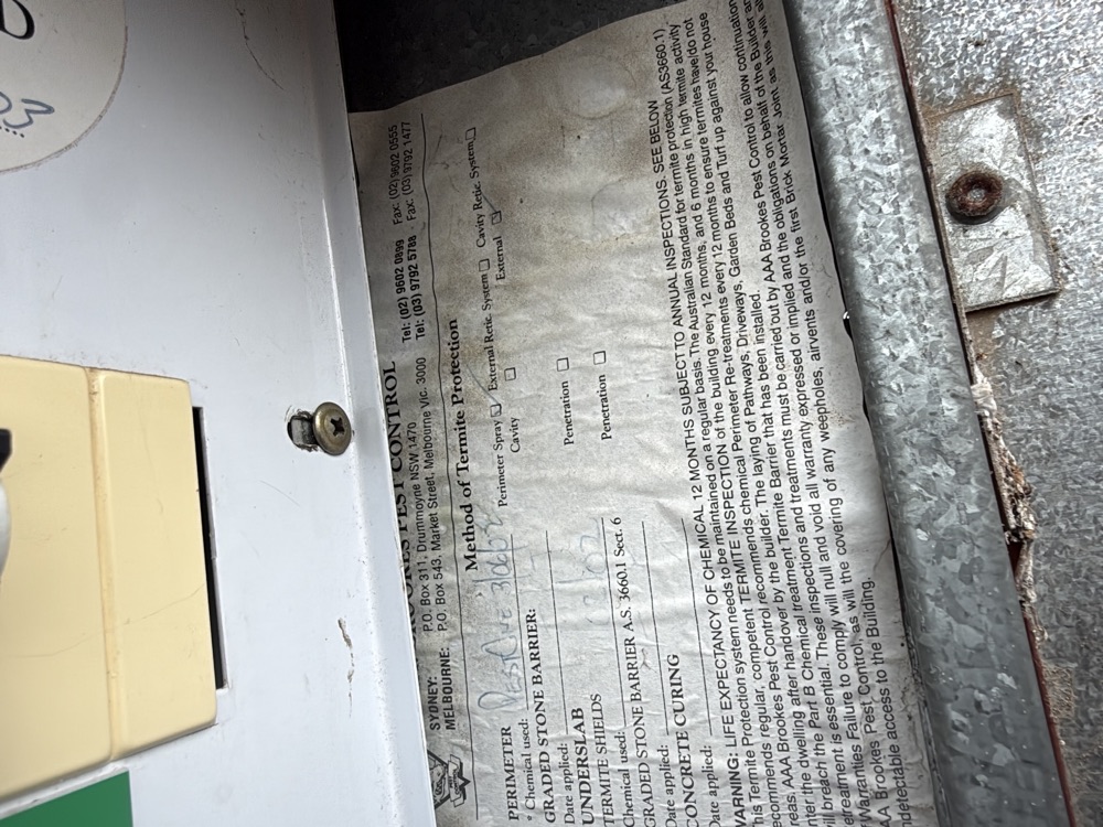 Termite treatment notice found in the meter box, recording the system installed, found during a building and pest inspection in Berwick, 10 km from Clyde